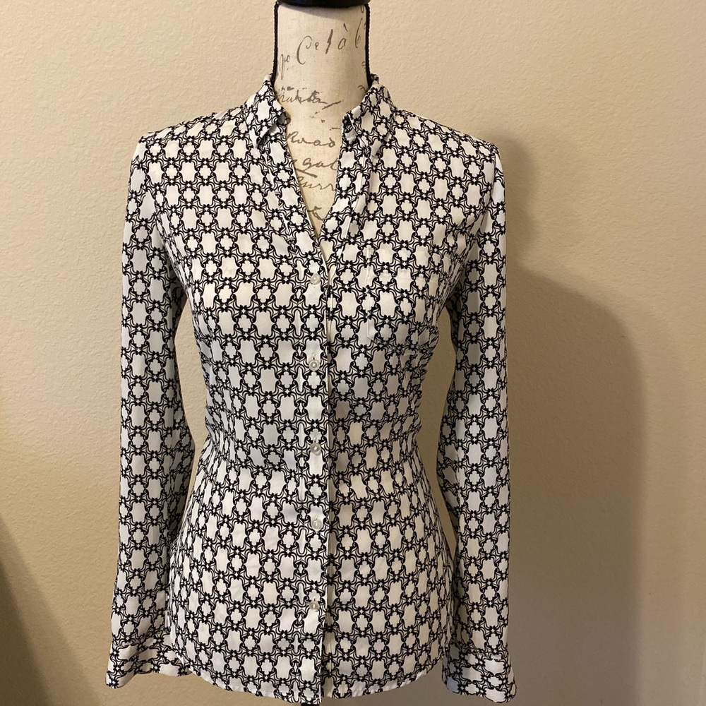 Black and cream printed blouse.